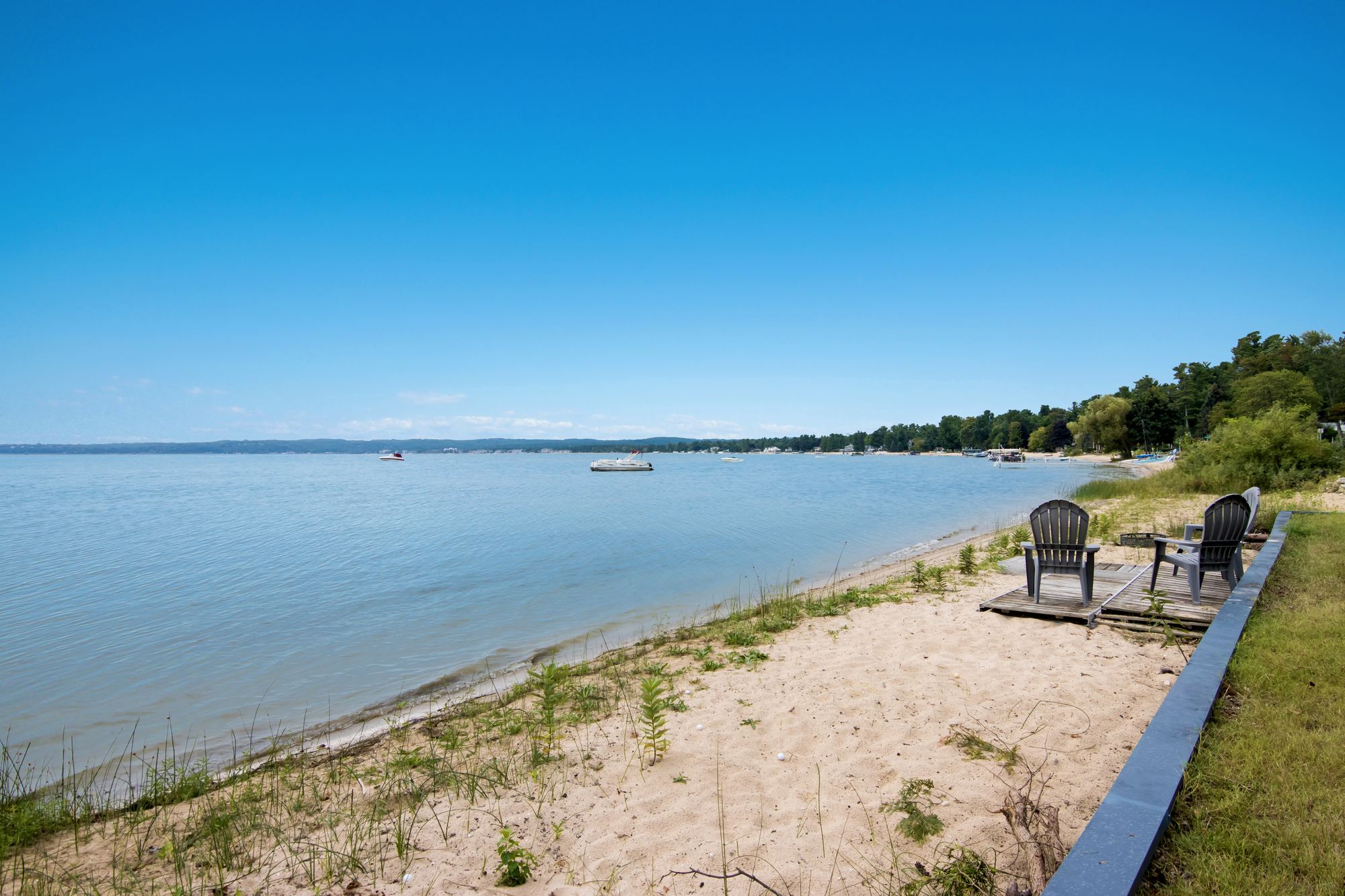 The private beach and water view at the lake villa on East Grand Traverse Bay