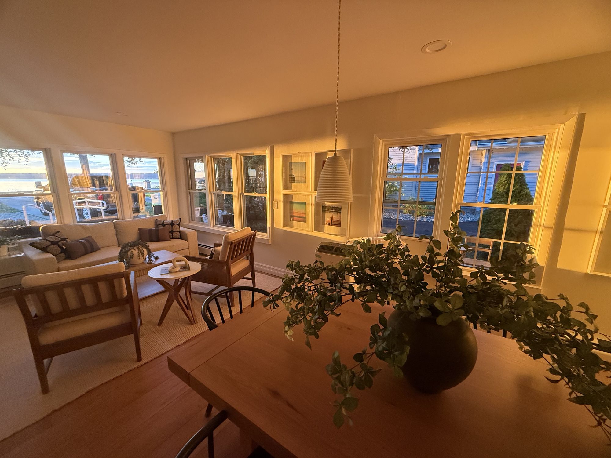 Golden hour light in the living area at the lake villa